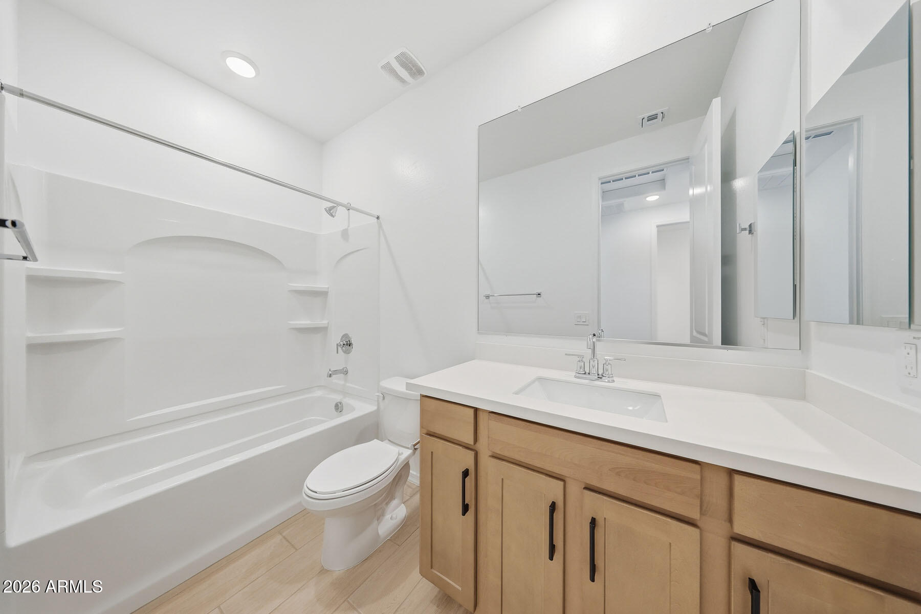 705 West Riparian Drive San Tan Valley, AZ 85140 - Photo 13 of 25 a bathroom with a sink a toilet and a bathtub