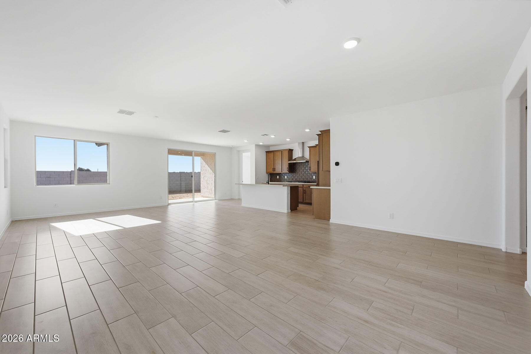 705 West Riparian Drive San Tan Valley, AZ 85140 - Photo 2 of 25 a view of a kitchen with furniture and an empty room