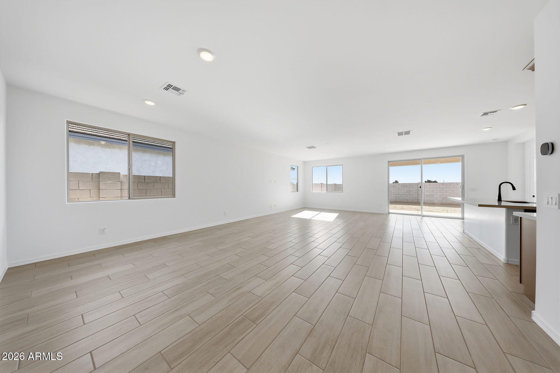 705 West Riparian Drive San Tan Valley, AZ 85140 - Photo 3 of 25 a view of empty room with wooden floor