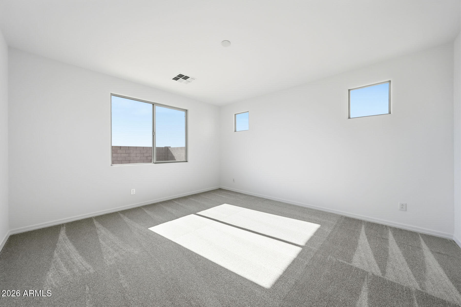 705 West Riparian Drive San Tan Valley, AZ 85140 - Photo 9 of 25 an empty room with windows