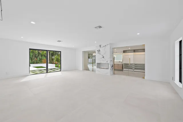 an empty room with windows