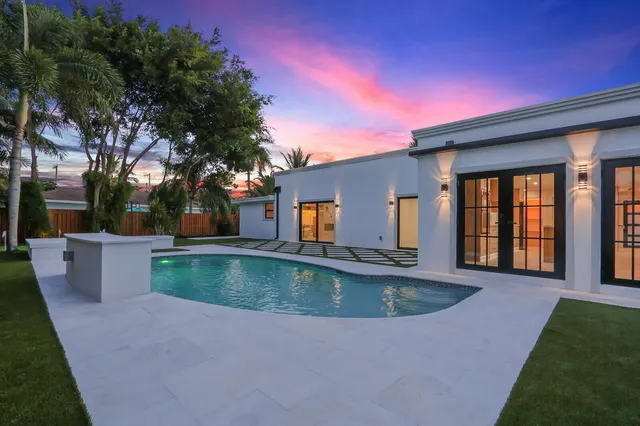 a view of a house with a swimming pool