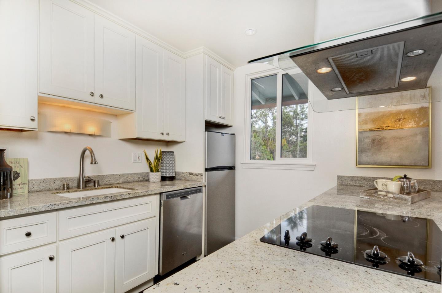 4106 George Avenue, Unit 2 San Mateo, CA 94403 - Photo 3 of 20 a kitchen with a sink stove and refrigerator