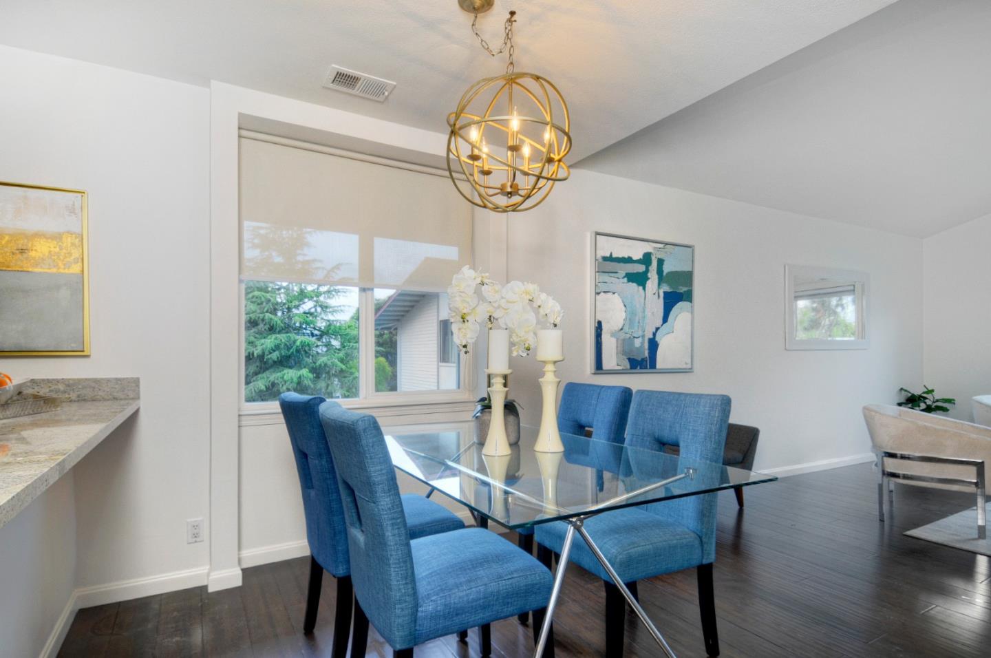 4106 George Avenue, Unit 2 San Mateo, CA 94403 - Photo 4 of 20 a view of a dining room with furniture window and wooden floor