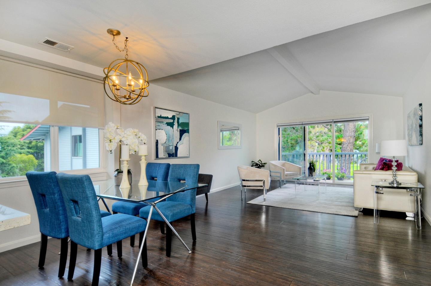 4106 George Avenue, Unit 2 San Mateo, CA 94403 - Photo 5 of 20 a view of a dining room with furniture a chandelier and wooden floor
