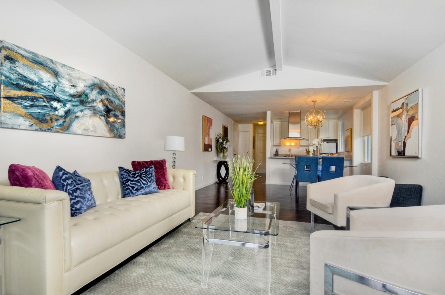 4106 George Avenue, Unit 2 San Mateo, CA 94403 - Photo 8 of 20 a living room with furniture and a chandelier