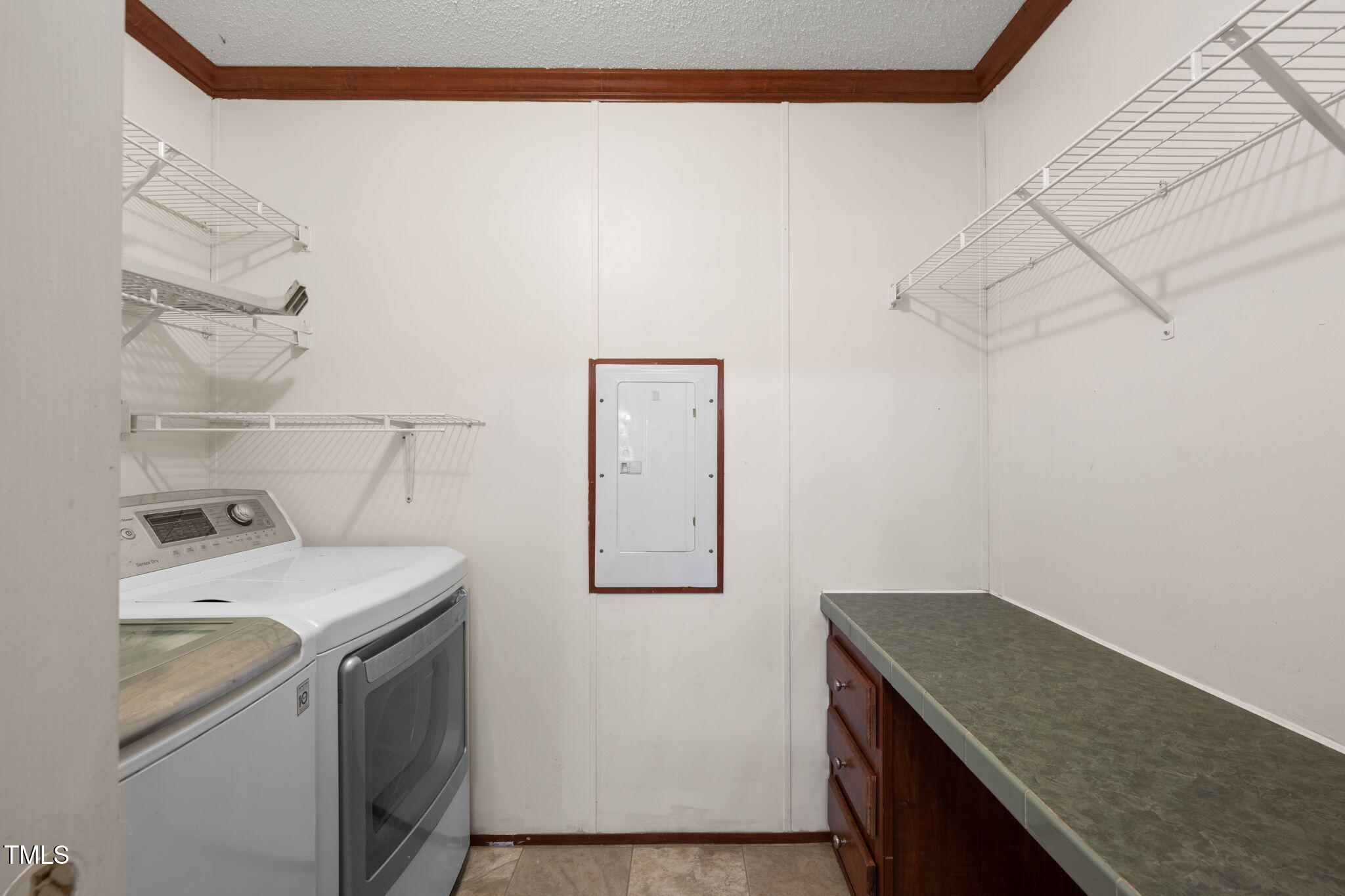 538 Allie Clay Road Roxboro, NC 27573 - Photo 11 of 37 a utility room with dryer and washer