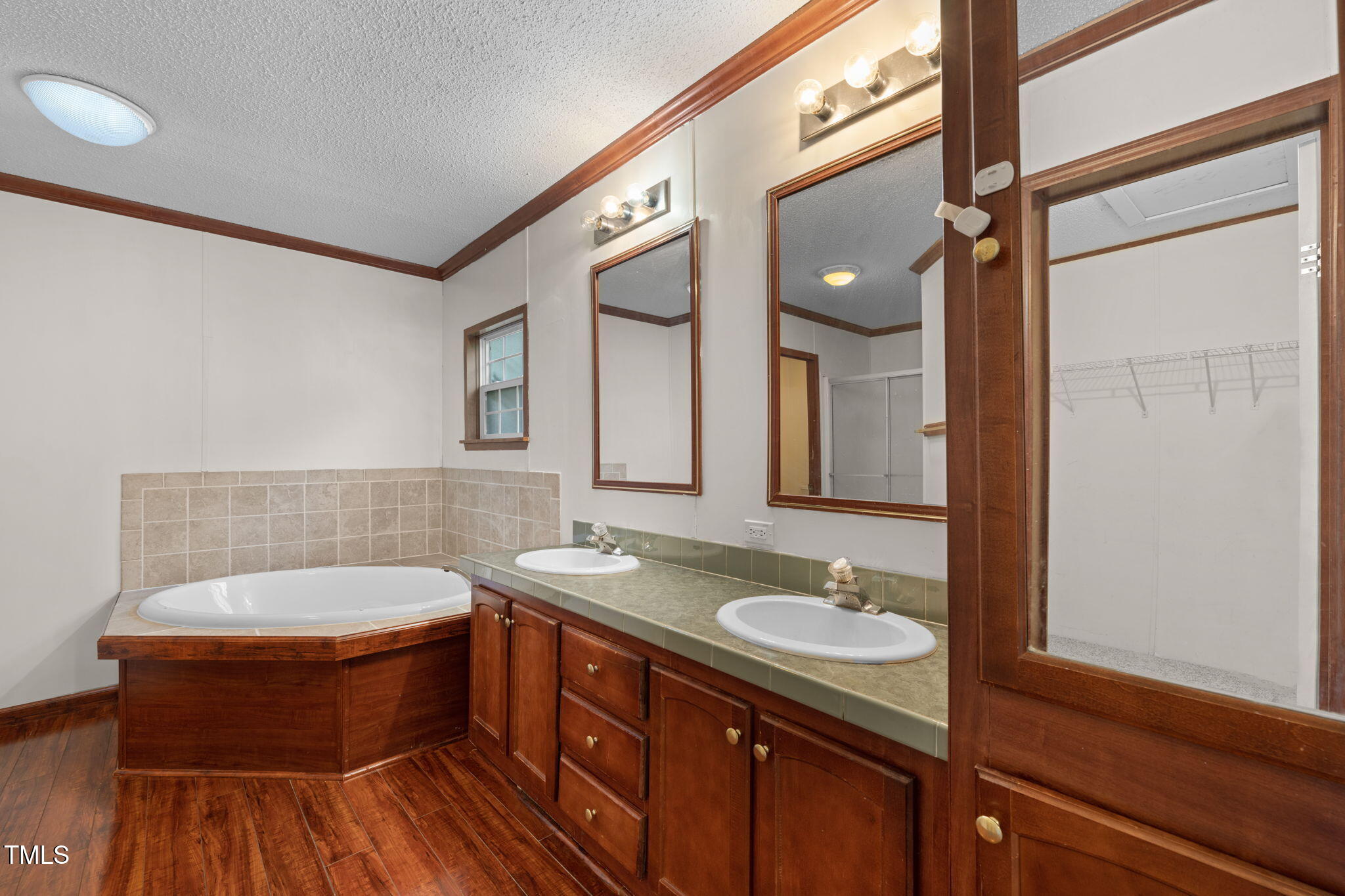 538 Allie Clay Road Roxboro, NC 27573 - Photo 15 of 37 a bathroom with a sink and a mirror