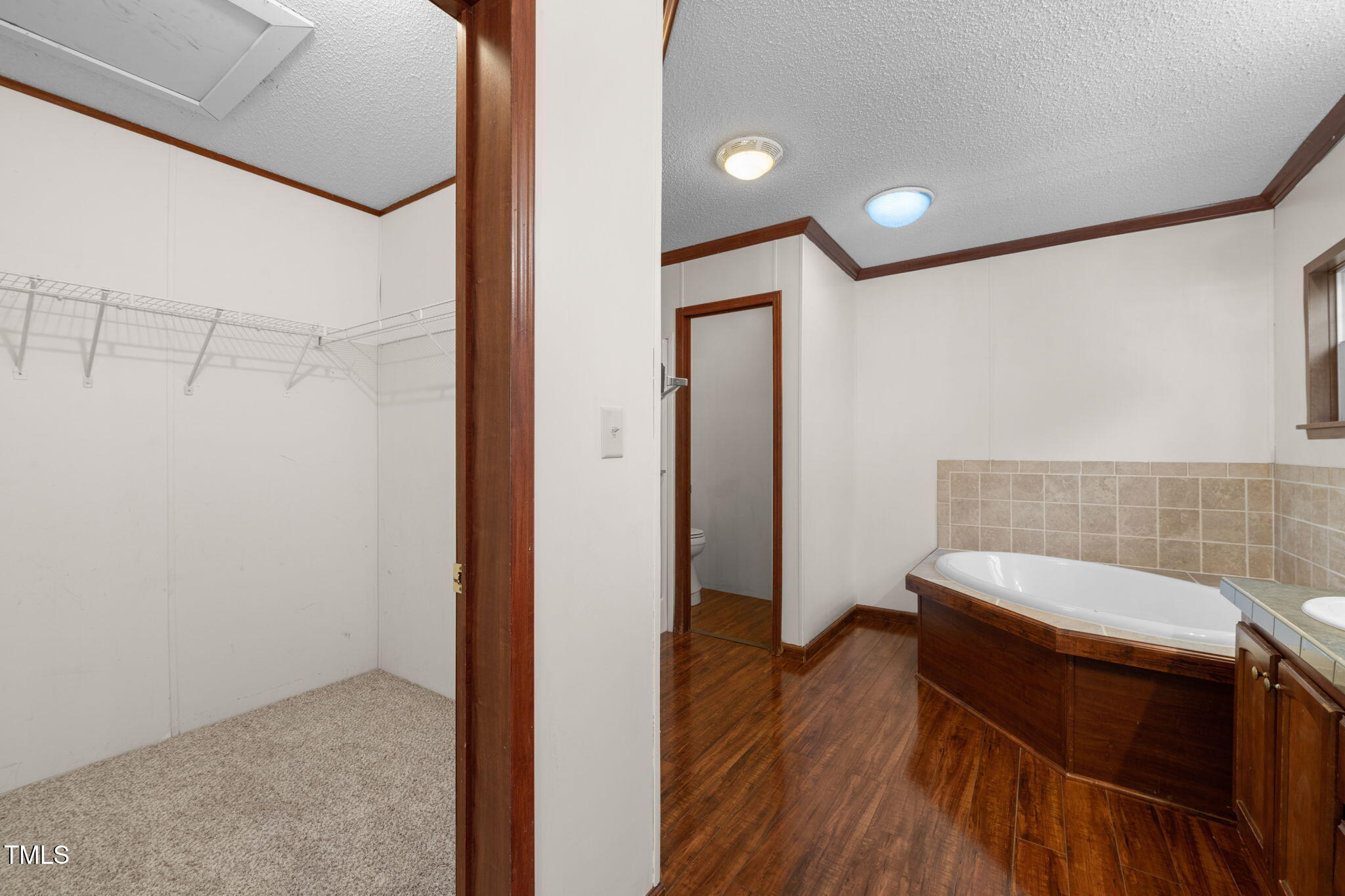 538 Allie Clay Road Roxboro, NC 27573 - Photo 16 of 37 a view of a bathroom with a tub and shower