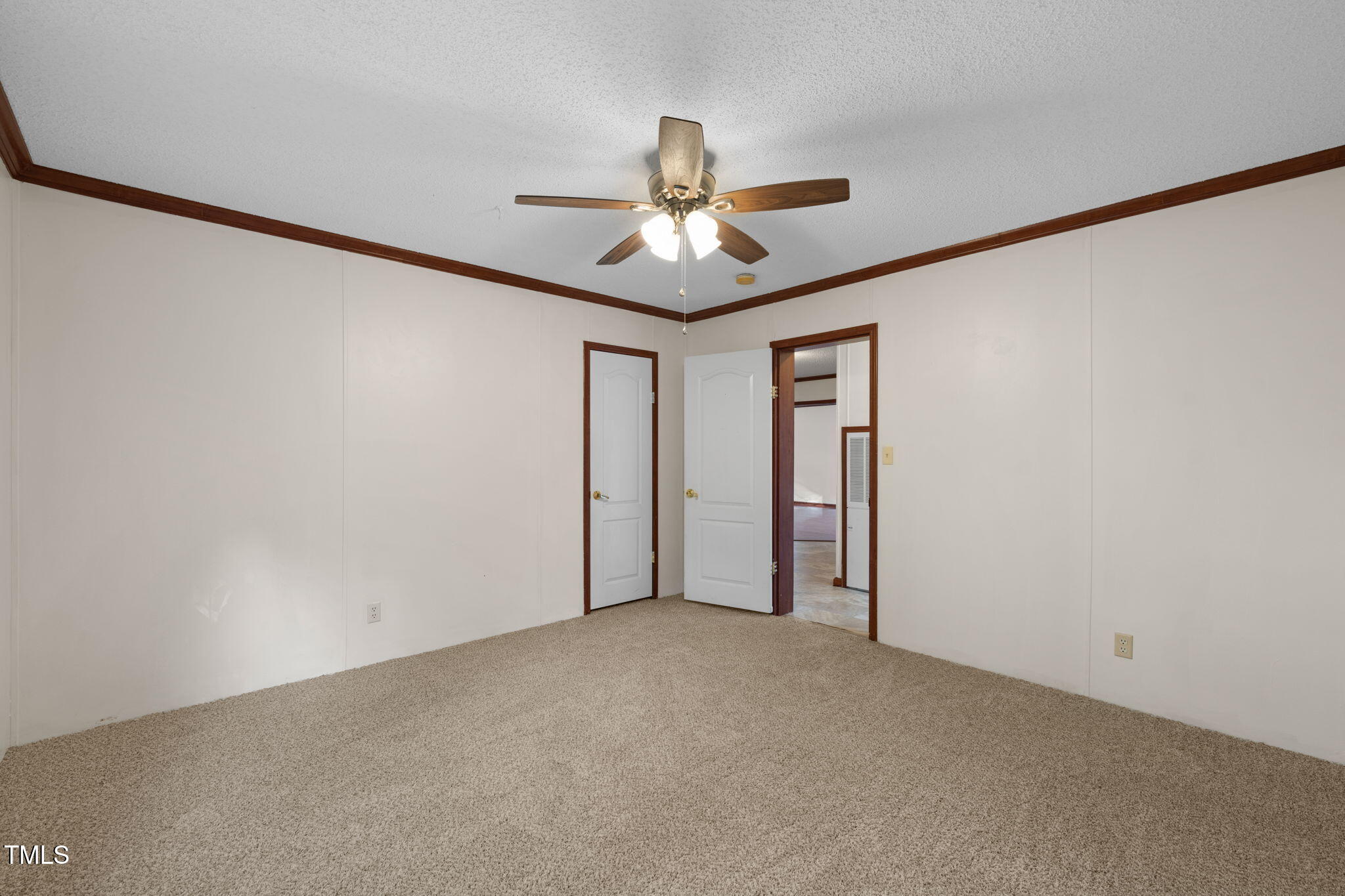 538 Allie Clay Road Roxboro, NC 27573 - Photo 24 of 37 a view of an empty room and chandelier fan