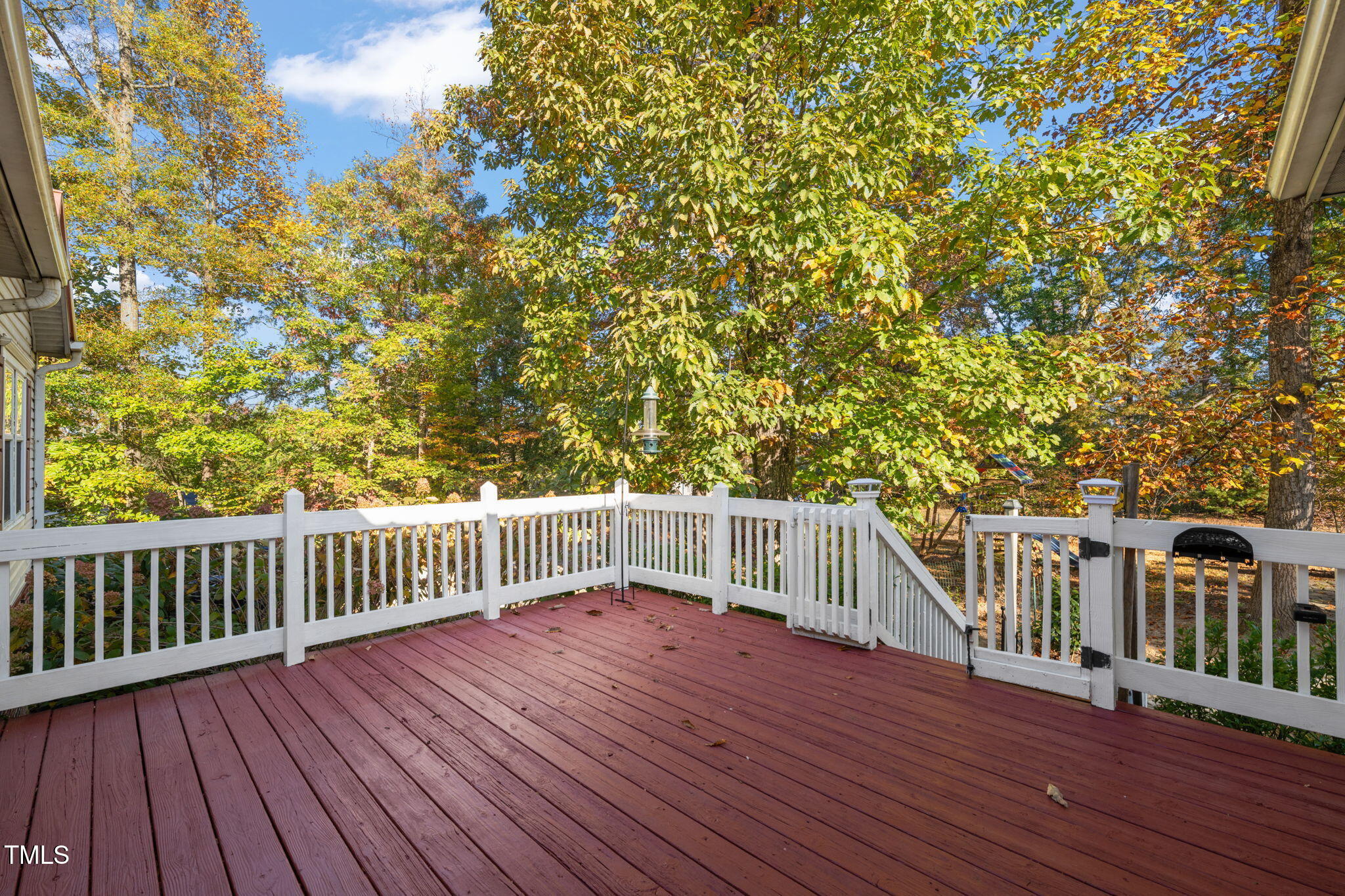 538 Allie Clay Road Roxboro, NC 27573 - Photo 26 of 37 a view of backyard with a deck and wooden floor