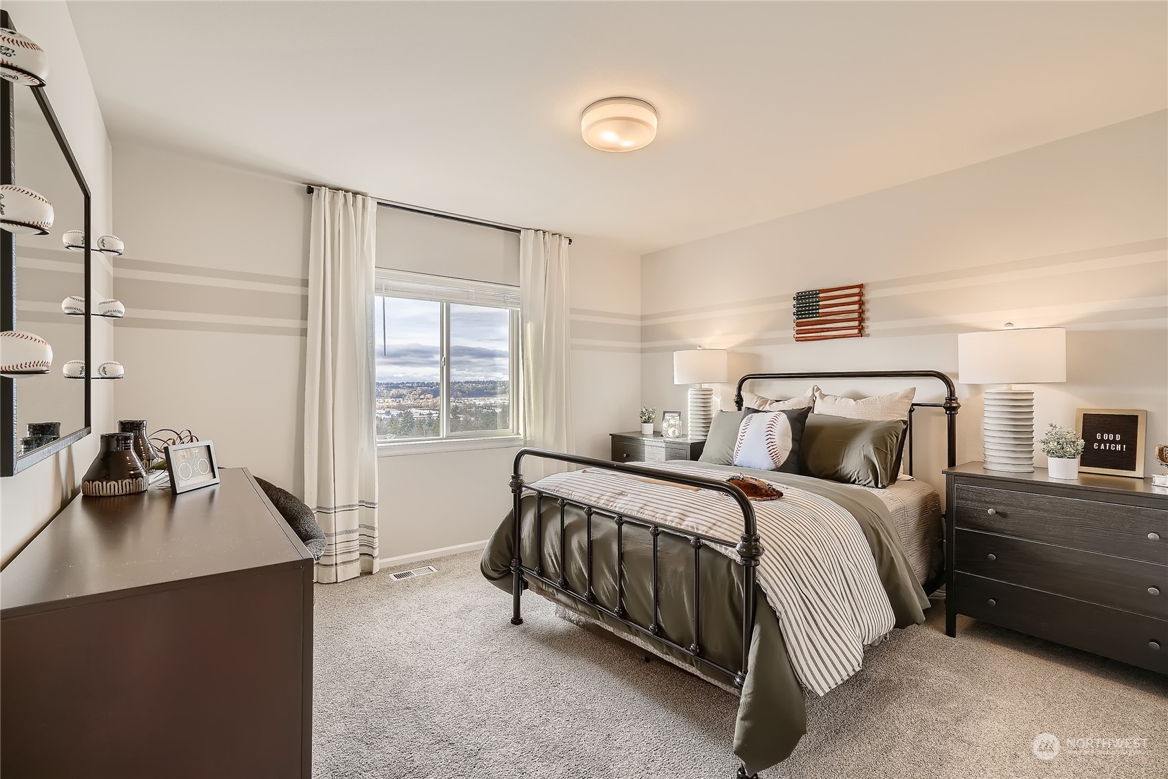 21032 42nd Drive Southeast, Unit 129 Bothell, WA 98021 - Photo 6 of 22 a bedroom with a bed and a window