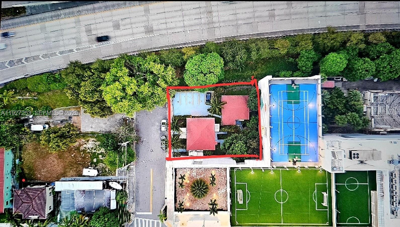 364 Southwest 11th Street Miami, FL 33130 - Photo 14 of 61 a aerial view of a house with an outdoor space and seating area