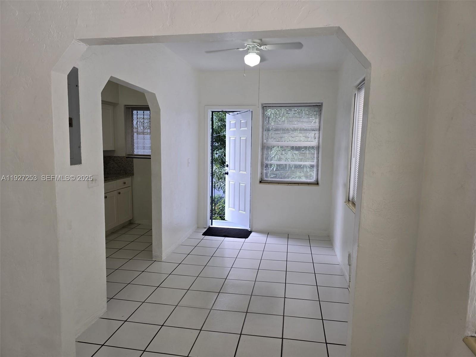 364 Southwest 11th Street Miami, FL 33130 - Photo 24 of 61 a view of an empty room with window and cabinet