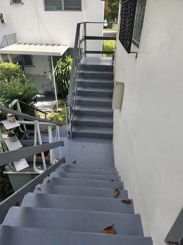 a view of a house with a swimming pool