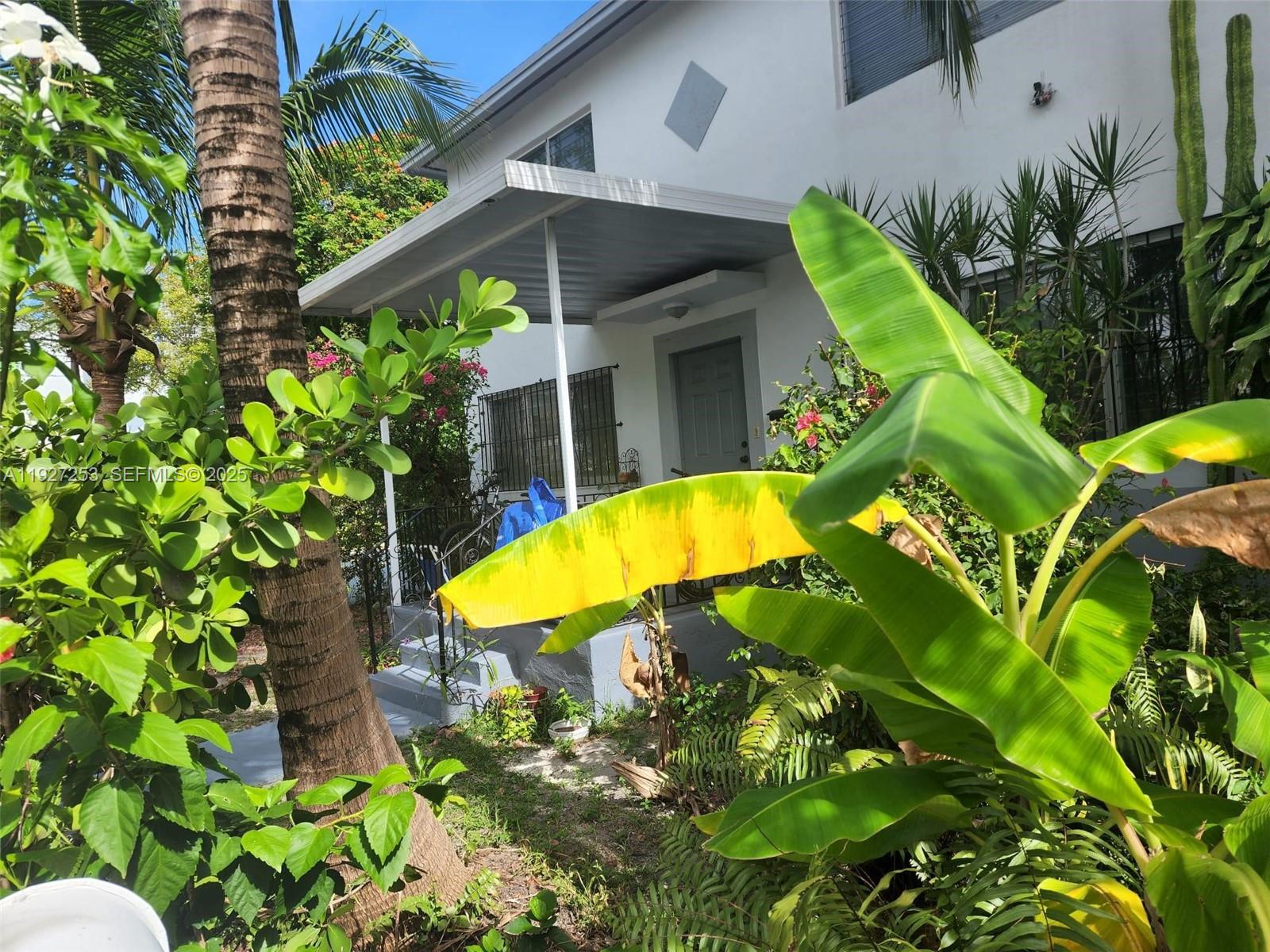 364 Southwest 11th Street Miami, FL 33130 - Photo 32 of 61 a view of a house with a swimming pool