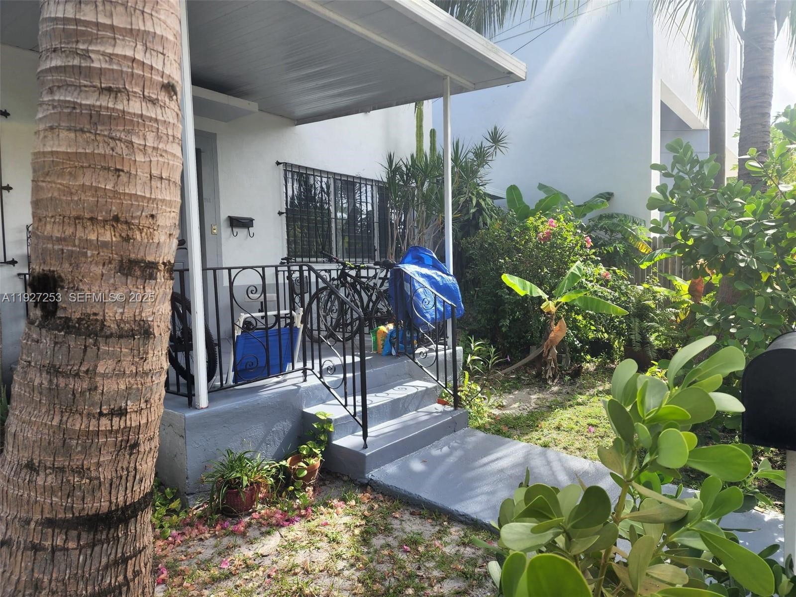 364 Southwest 11th Street Miami, FL 33130 - Photo 34 of 61 a view of path along with potted plants