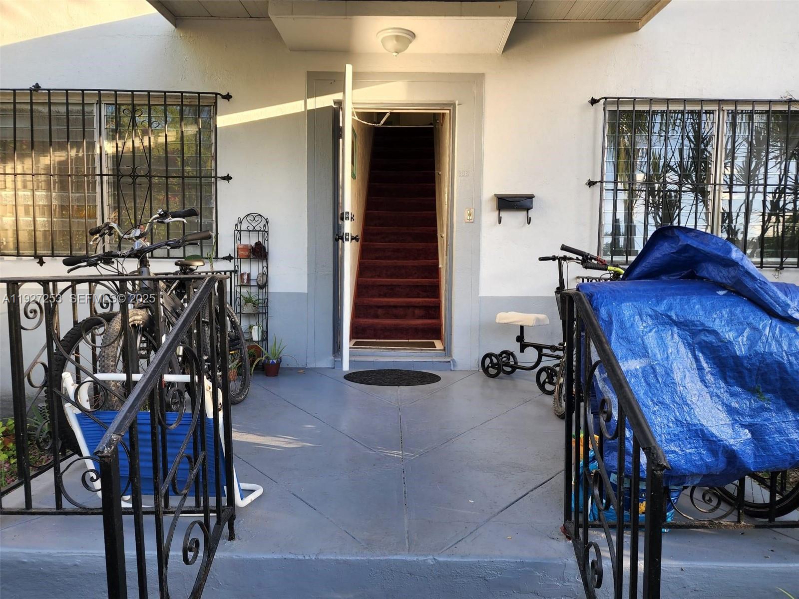 364 Southwest 11th Street Miami, FL 33130 - Photo 36 of 61 a view of a livingroom with furniture and gym equipment