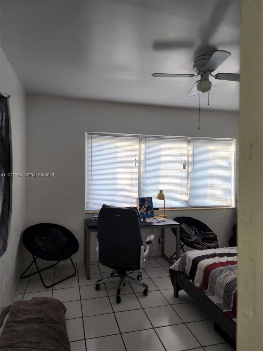 364 Southwest 11th Street Miami, FL 33130 - Photo 47 of 61 a workspace with furniture and a window