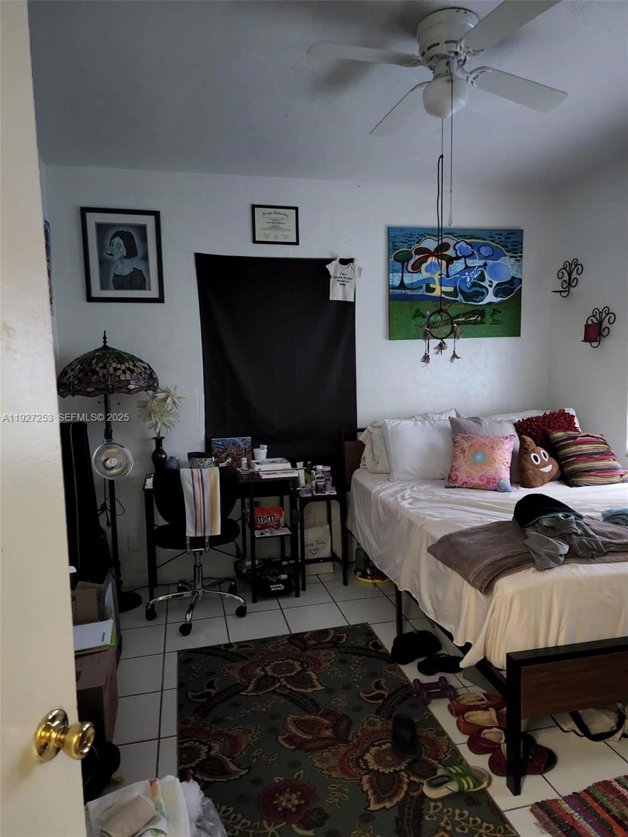 364 Southwest 11th Street Miami, FL 33130 - Photo 49 of 61 a living room with furniture and a flat screen tv