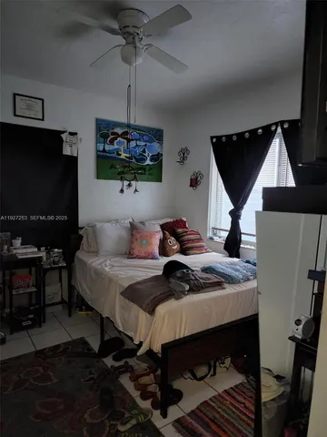 a view of a red chairs in front of a window