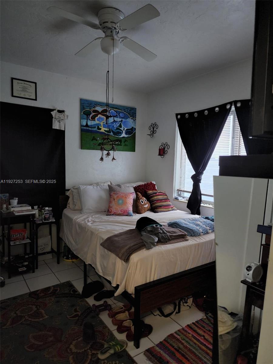 364 Southwest 11th Street Miami, FL 33130 - Photo 50 of 61 a table room with furniture and a flat screen tv