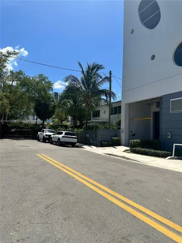 a car parked in front of a house