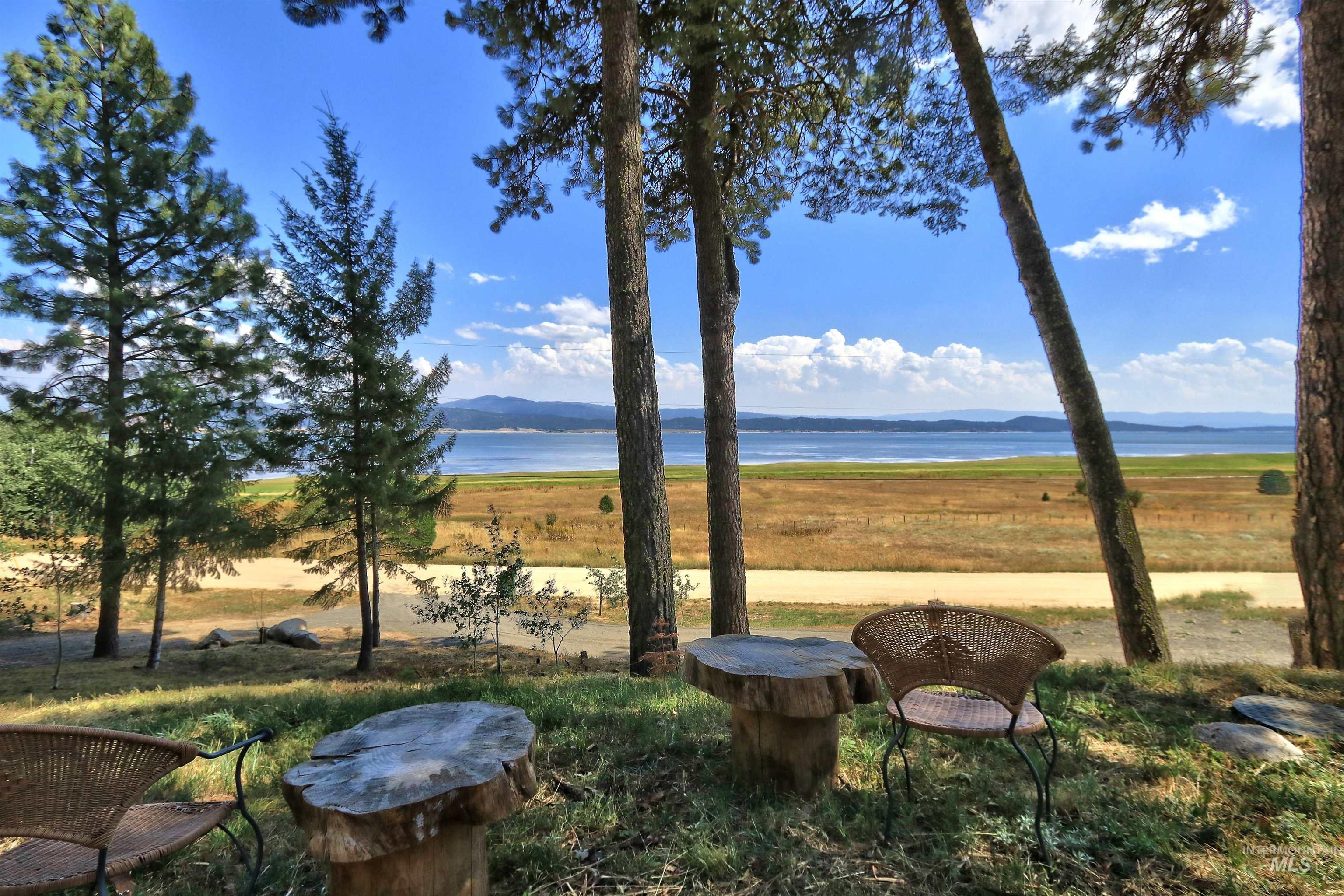 1539 West Mountain Road Cascade, ID 83611 - Photo 24 of 33 View of yard with a water and mountain view