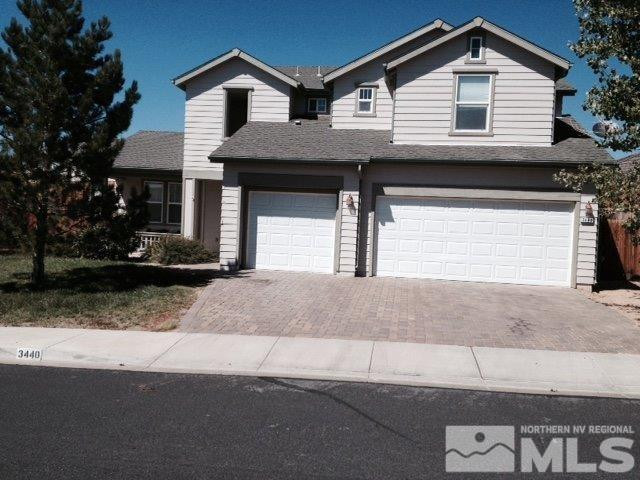 3440 Weaver Place Reno, NV 89512 - Photo 1 of 1 a front view of a house with garage