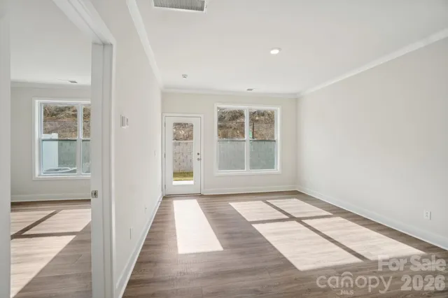 an empty room with windows