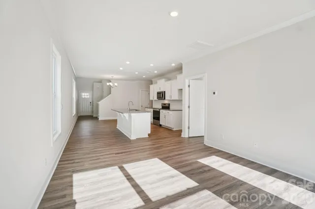 a view of kitchen with wooden floor