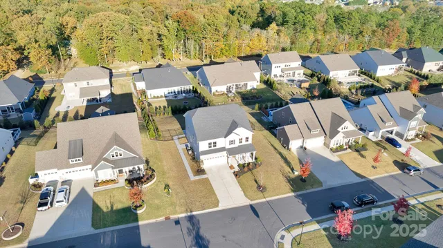 an aerial view of residential building with parking space