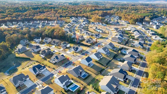 an aerial view of a swimming pool