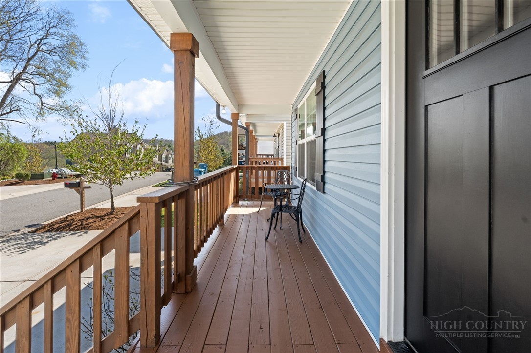 228 Stratford Lane Boone, NC 28607 - Photo 4 of 33 a view of balcony with wooden floor and fence