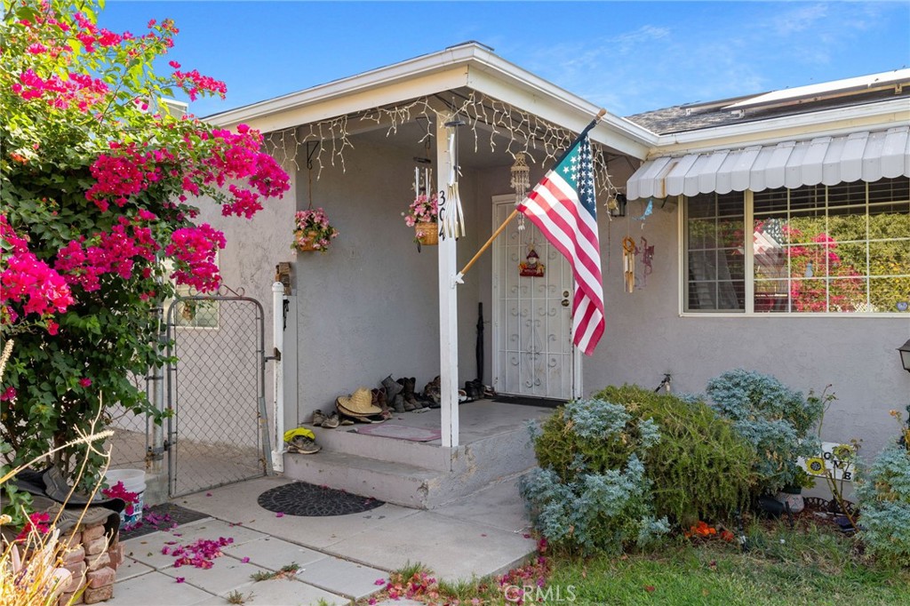 304 Adams Street Taft, CA 93268 - Photo 2 of 28 a front view of a house