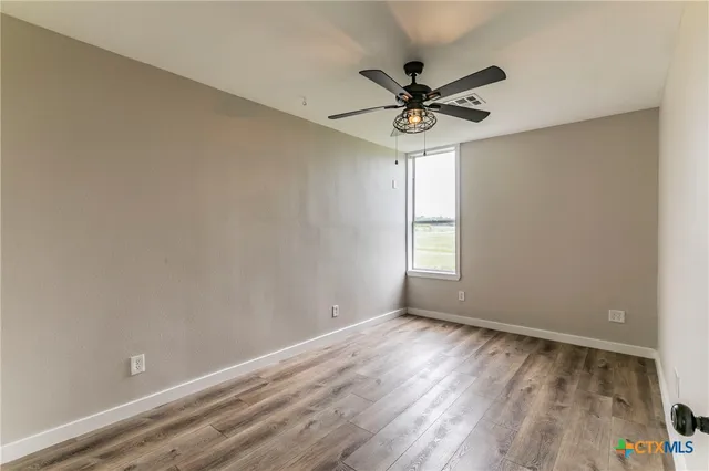 a view of an ocean and a yard