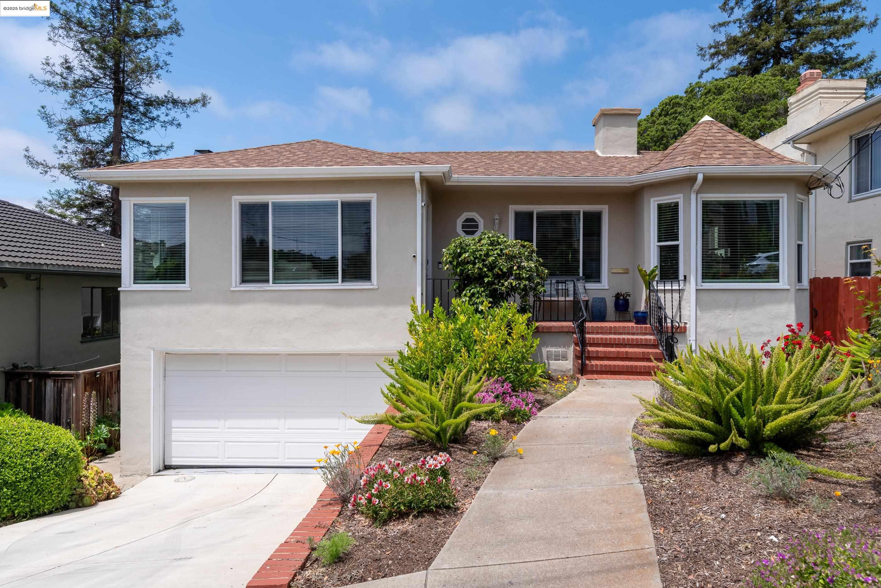 4151 Eastlake Avenue Oakland, CA 94602 - Photo 3 of 3 a front view of a house with a garden