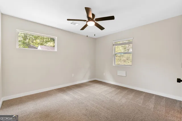 a bathroom with a shower and a bathtub