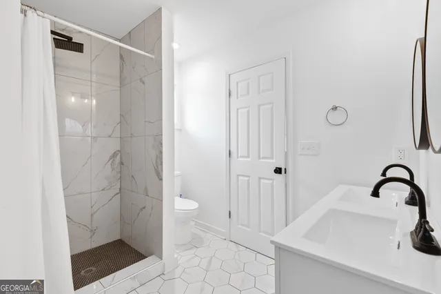 a view of a wooden deck with furniture