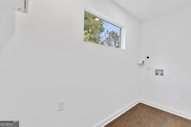 a view of a hallway with a white walls
