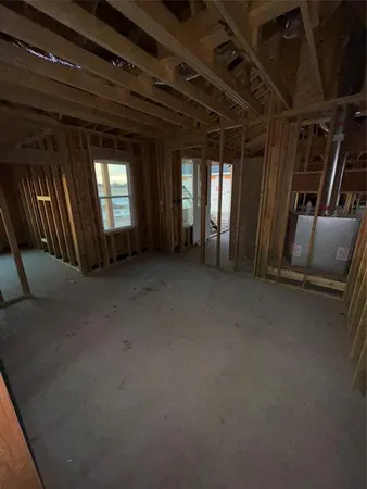 a view of empty room with windows