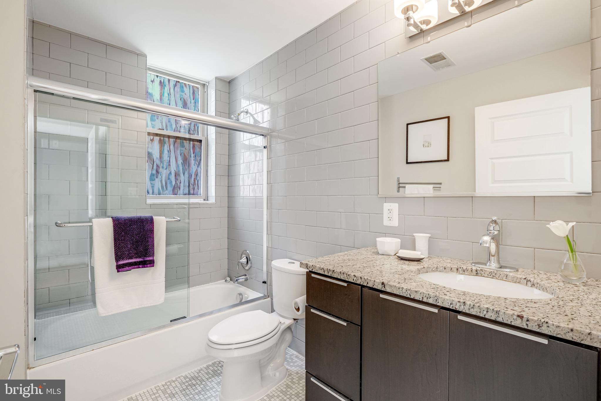 1801 Wyoming Avenue Northwest, Unit 22 Washington, DC 20009 - Photo 13 of 22 Primary en-suite bath