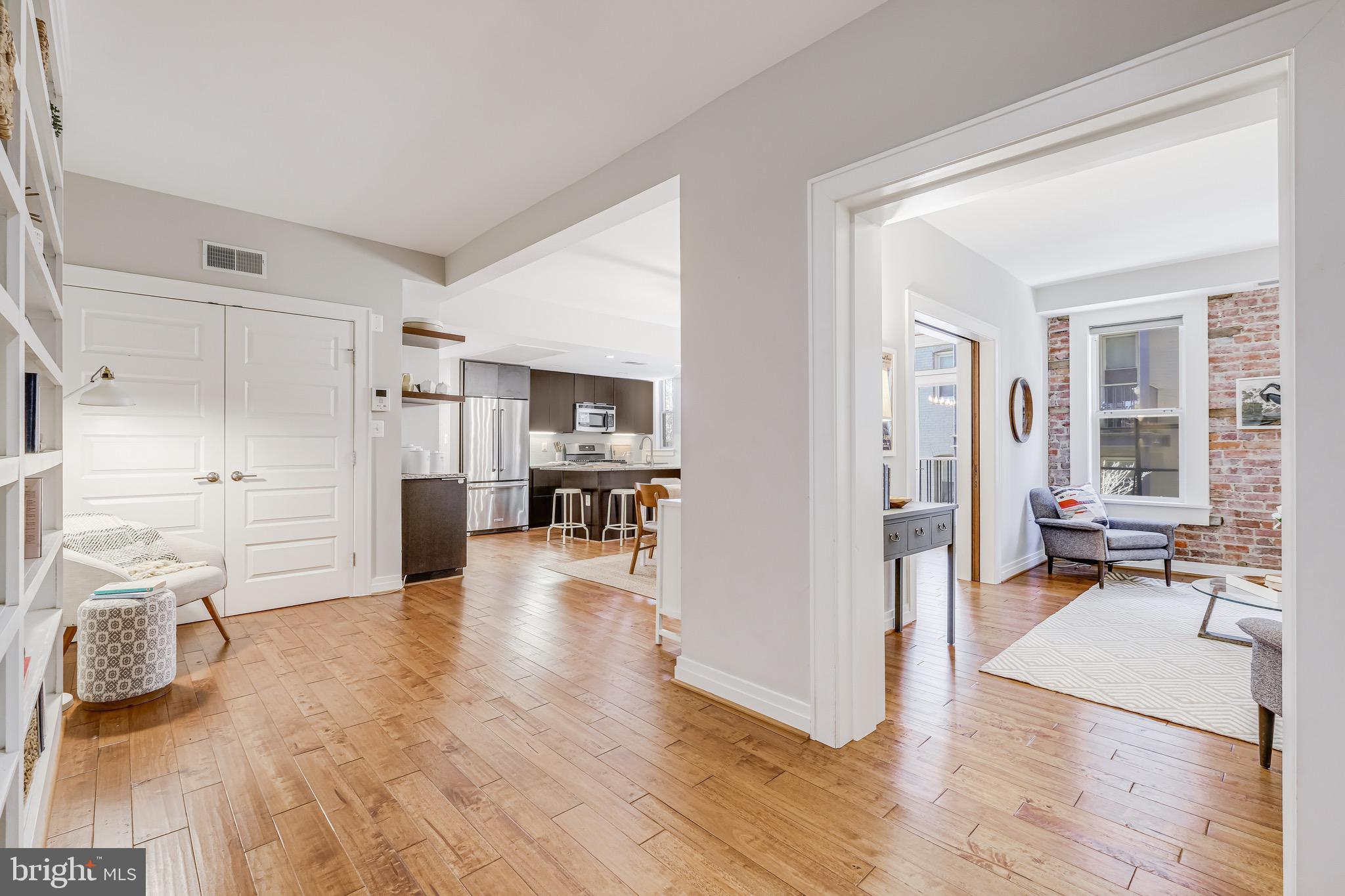 1801 Wyoming Avenue Northwest, Unit 22 Washington, DC 20009 - Photo 4 of 22 Foyer with built-ins and large closet