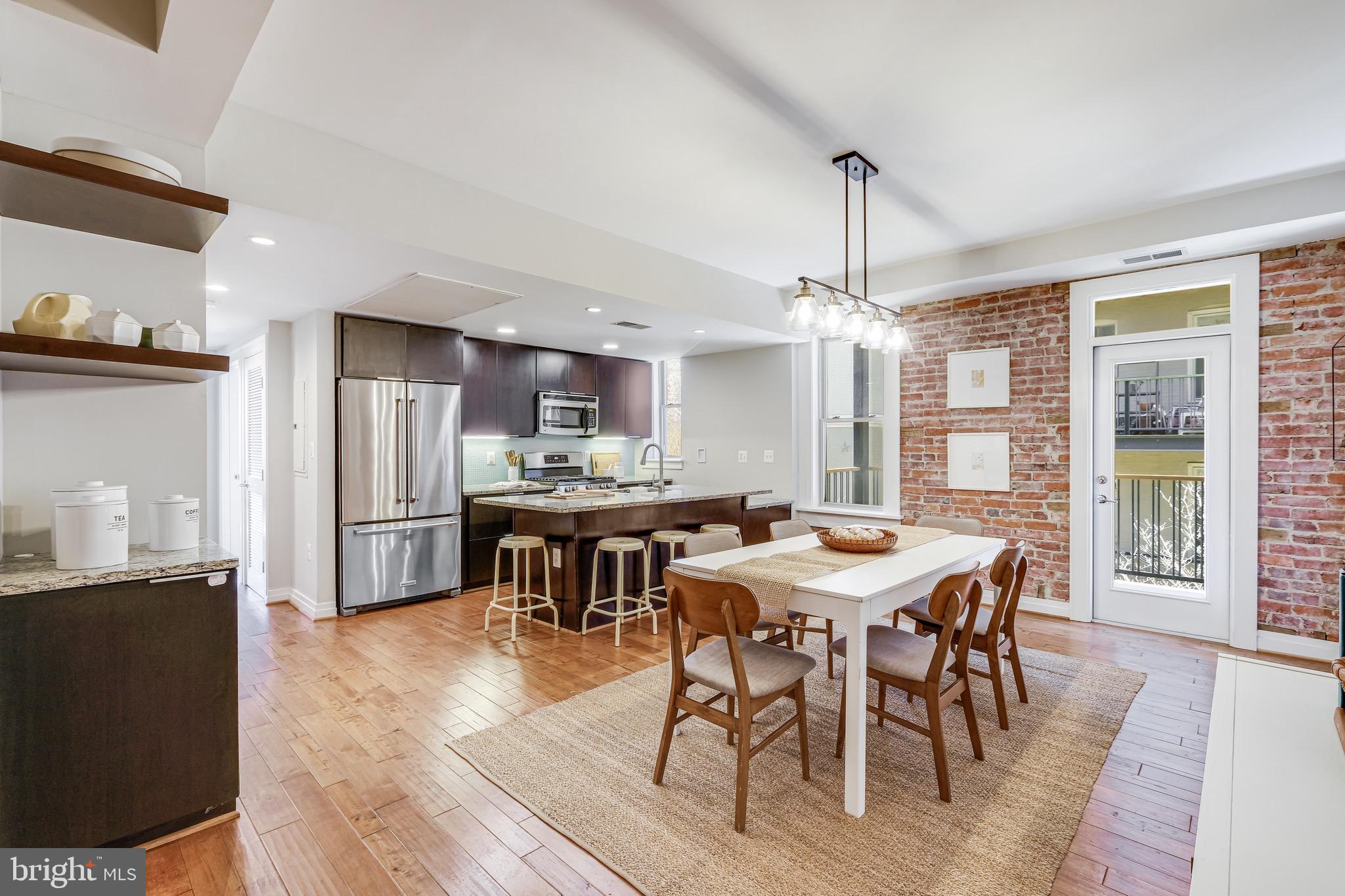 1801 Wyoming Avenue Northwest, Unit 22 Washington, DC 20009 - Photo 8 of 22 Dining area open to kitchen