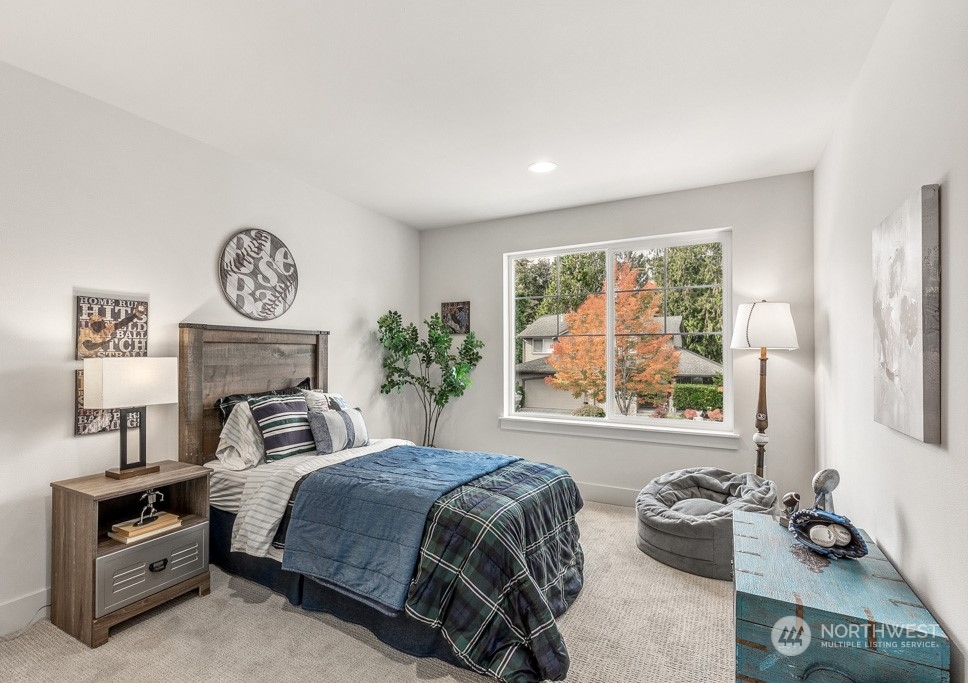 23337 13th (lot 5) Avenue Southeast Bothell, WA 98021 - Photo 13 of 27 a bedroom with a bed and a window