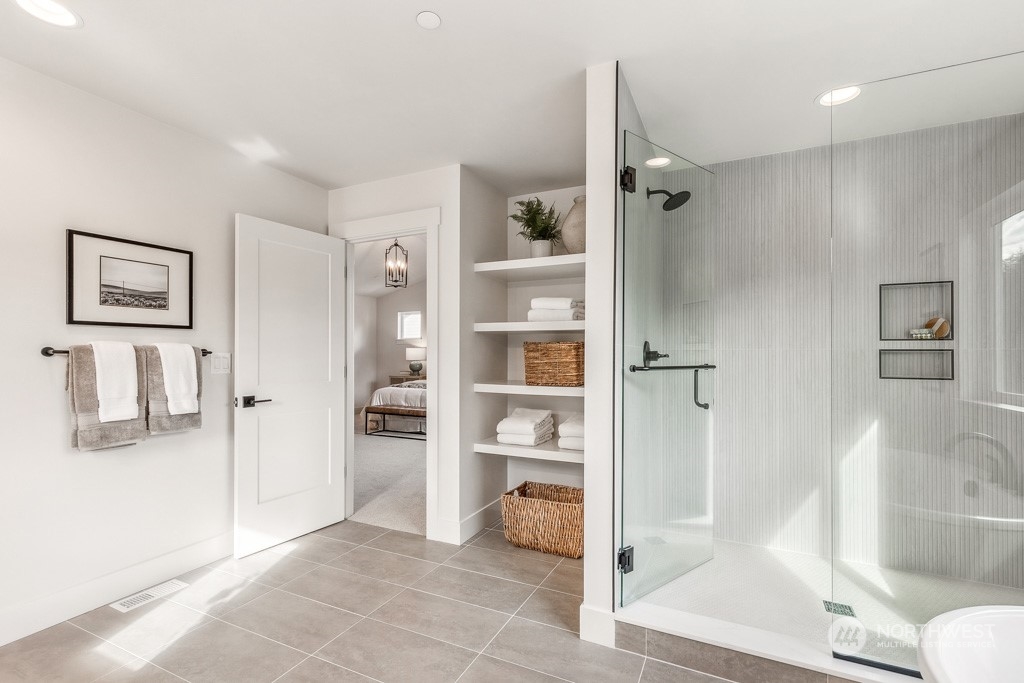 23337 13th (lot 5) Avenue Southeast Bothell, WA 98021 - Photo 24 of 27 a bathroom with a tub and shower