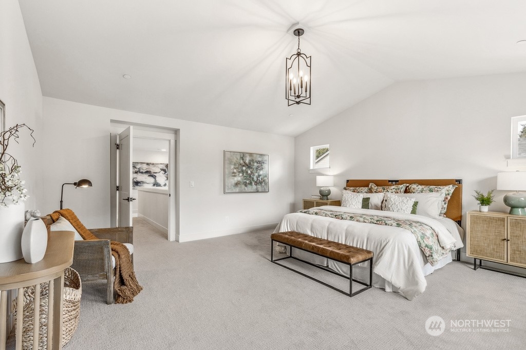 23337 13th (lot 5) Avenue Southeast Bothell, WA 98021 - Photo 26 of 27 a spacious bedroom with a bed and a desk