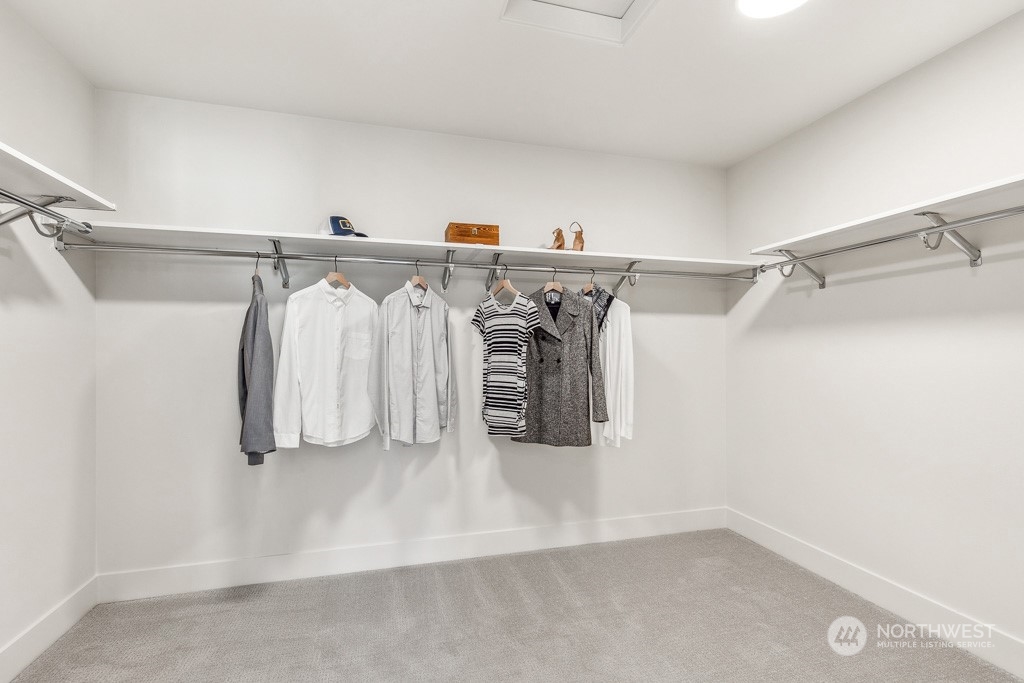 23337 13th (lot 5) Avenue Southeast Bothell, WA 98021 - Photo 27 of 27 a view of walk in closet with clothes and shoes