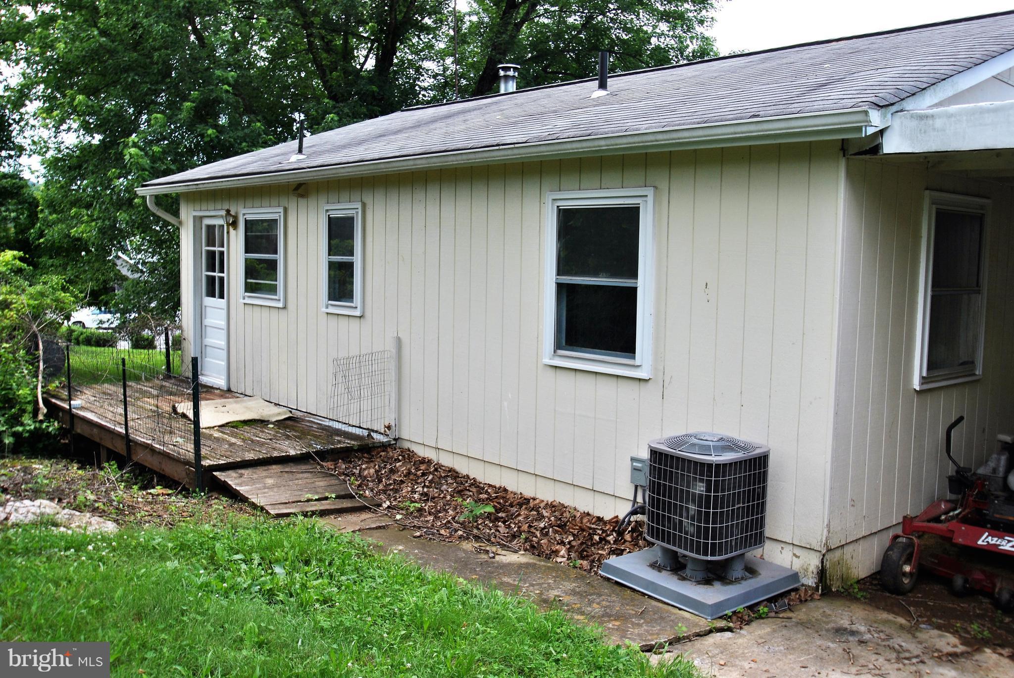 5930 Howellsville Road Front Royal, VA 22630 - Photo 13 of 22 a backyard of a house with lots of green space