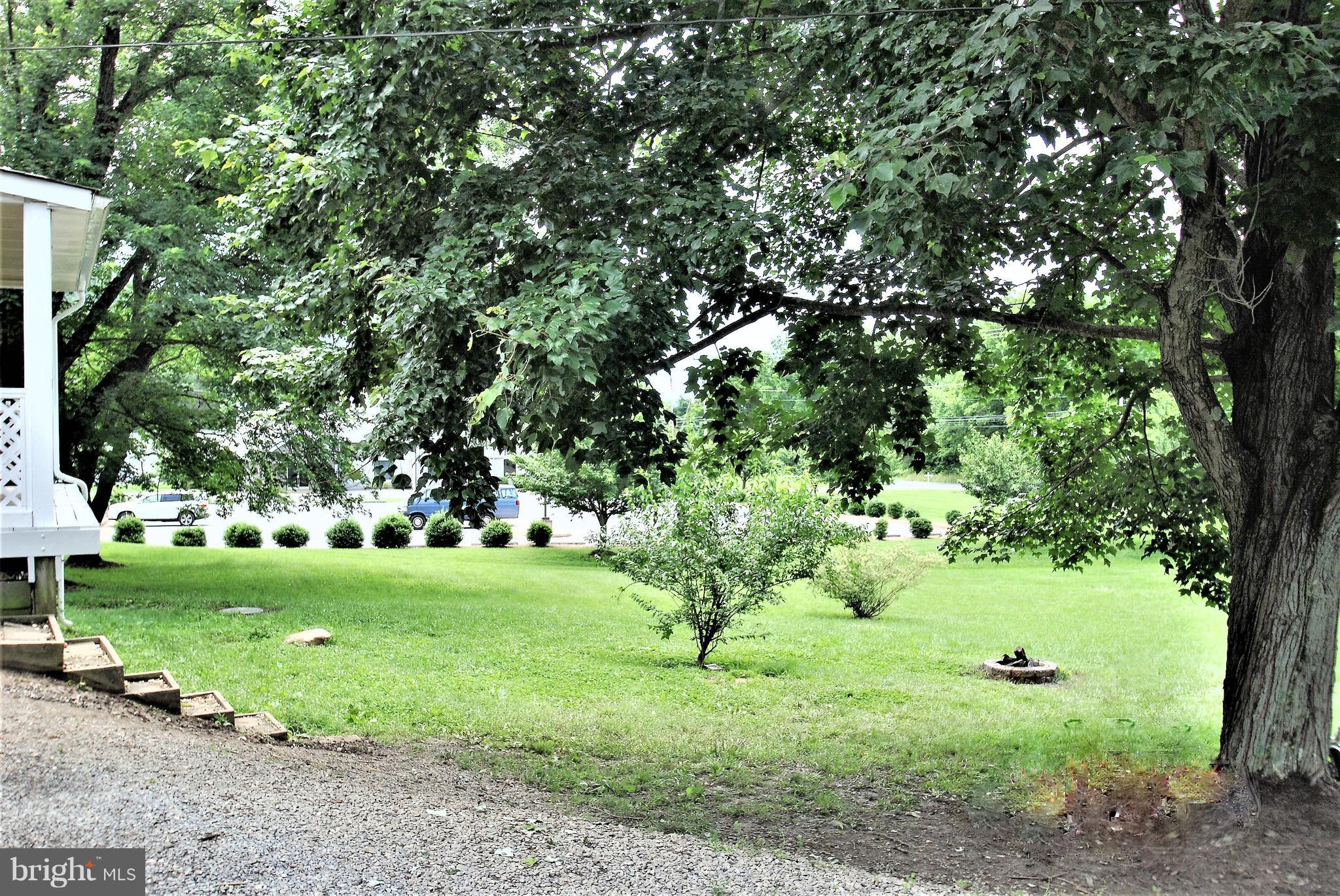 5930 Howellsville Road Front Royal, VA 22630 - Photo 17 of 22 a view of a garden with large trees
